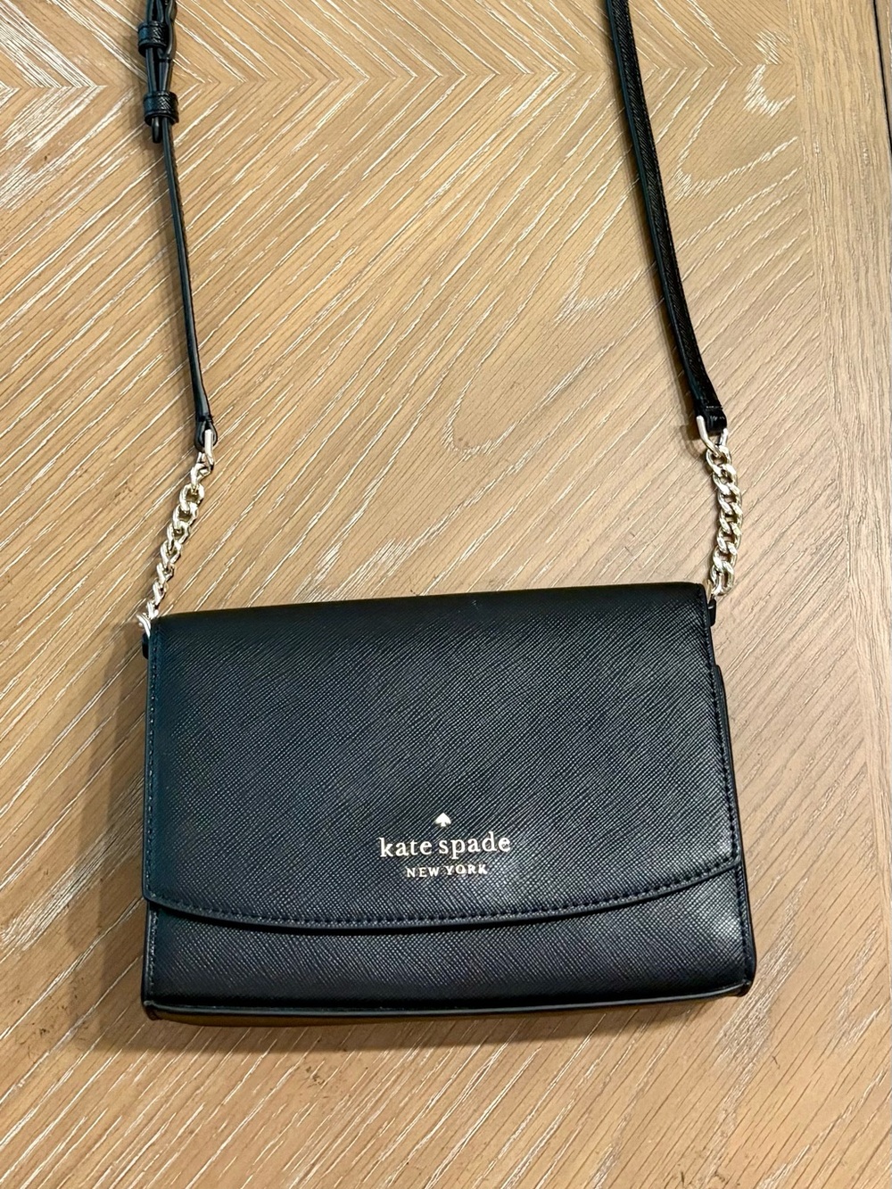 Kate Spade Staci mini crossbody bag in black.